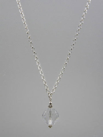 Sterling silver 5 mm round rolo chain with 16 mm crystal ball pendant. Length of chain is 18 inches.