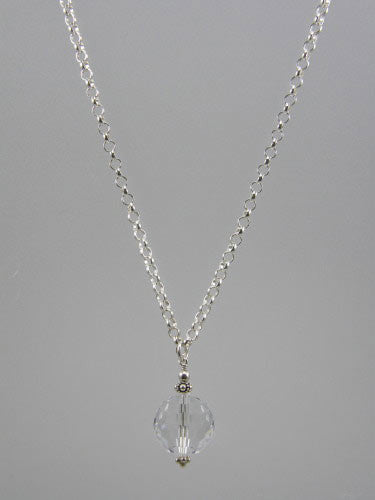 Sterling silver 5 mm round rolo chain with 16 mm crystal ball pendant. Length of chain is 18 inches.