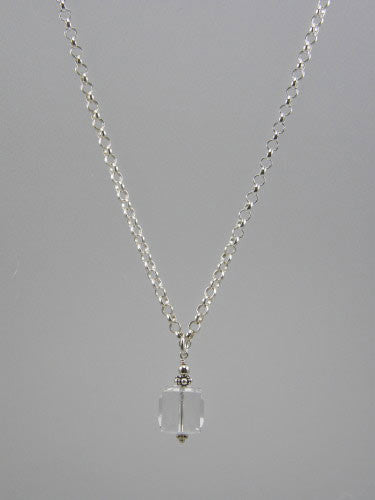 Sterling silver 5 mm round rolo chain with 12 mm crystal cube pendant.