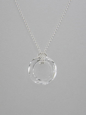 Sterling silver thin ball or rolo chain is knotted around round crystal ring pendant