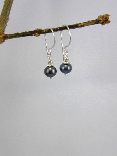 7mm dark grey pearl with silver spacer and ball.