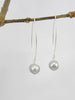 10 mm light grey pearl on a silver wishbone hook.